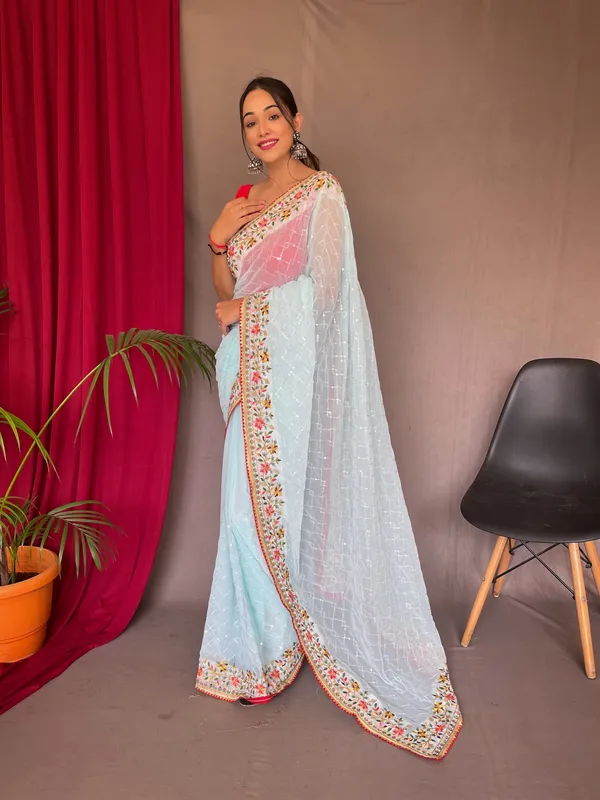 Sky_Blue_Bollywood_Style_Partywear_Sequins_Saree_With_Blouse_Piece_Attached